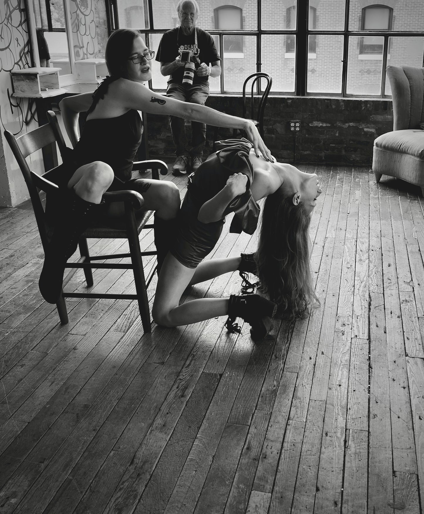 Two Women in Seductive Pose with Chair