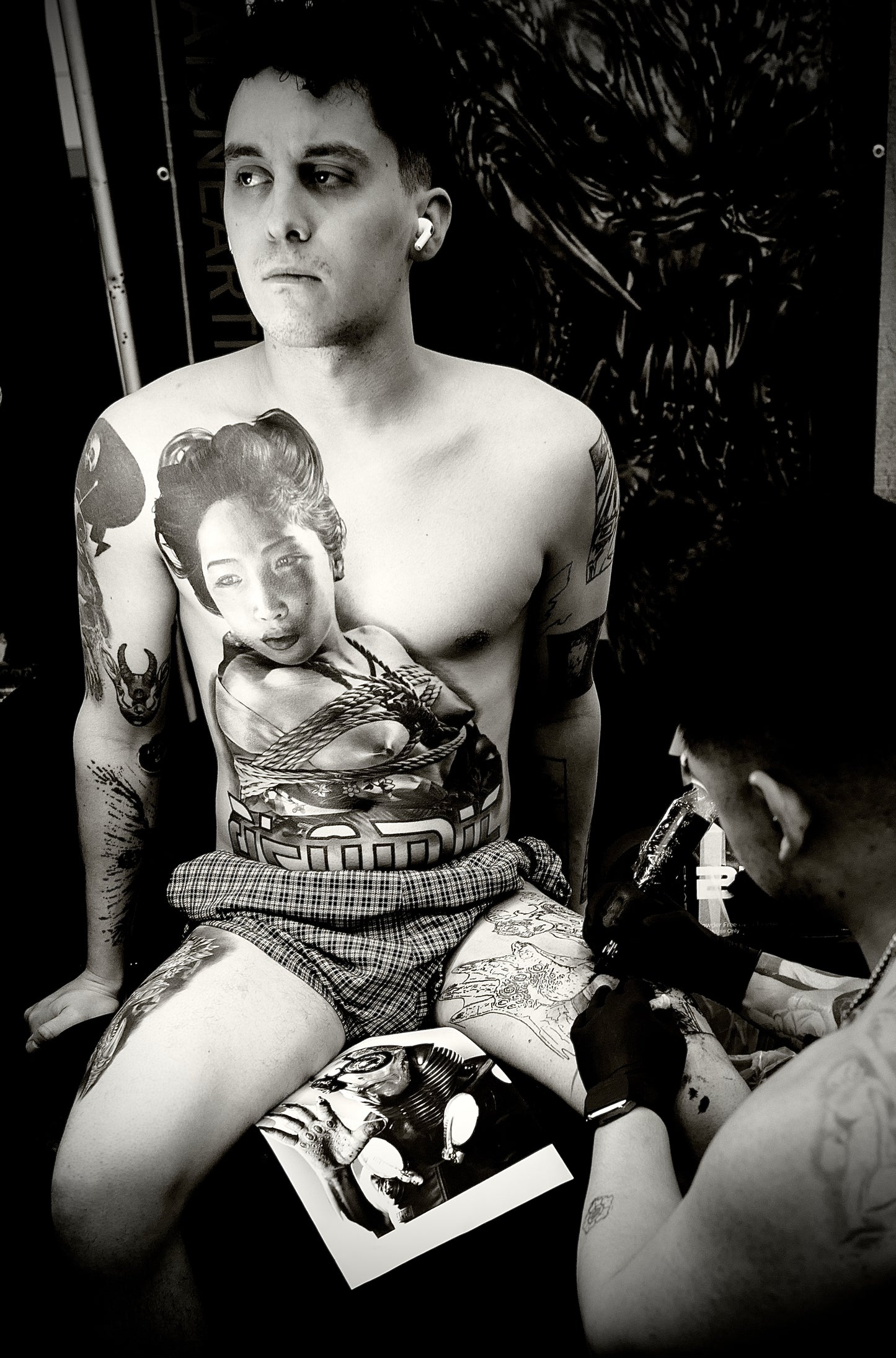 Man with Asian Woman Tattooed on Chest