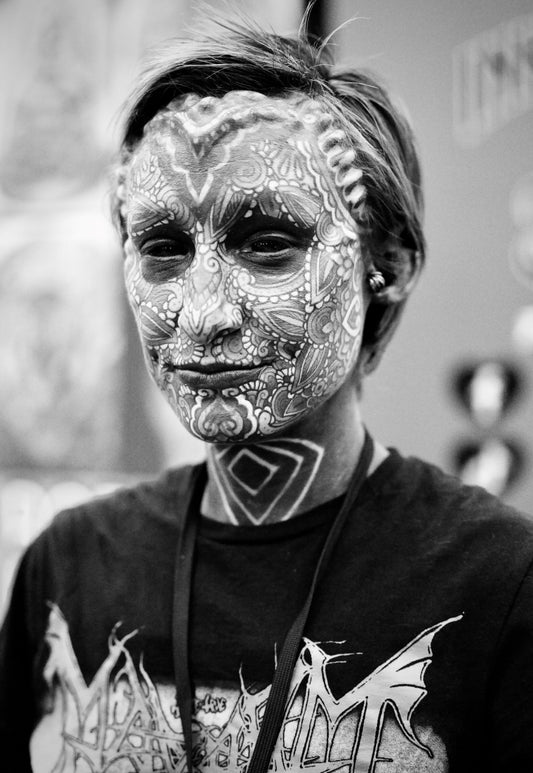Woman with Full Facial Tattoo and Implants