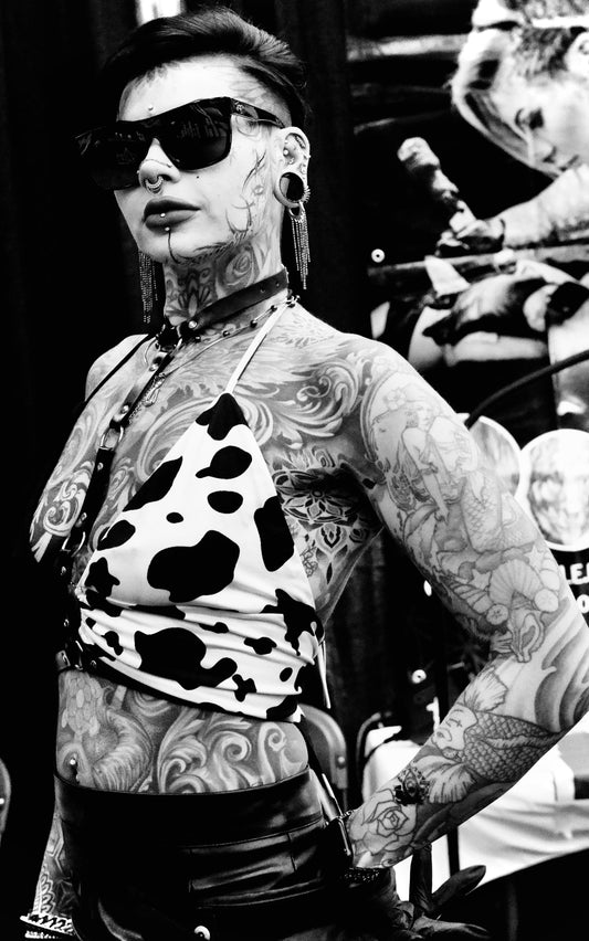 Heavily Tattooed Woman with Cow Print Halter