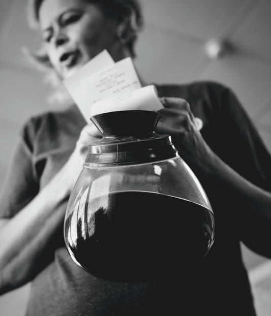 Waitress Holding Coffee Pot